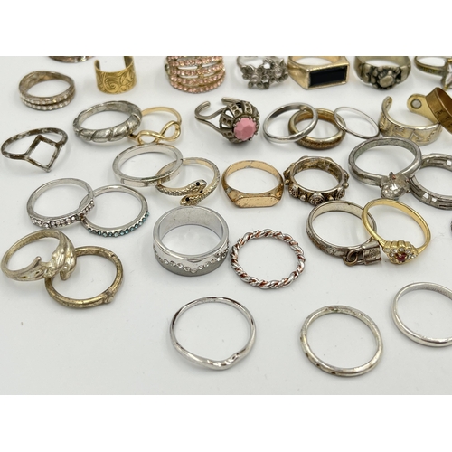 2062 - A collection of dress rings to include white metal, silver plated etc.