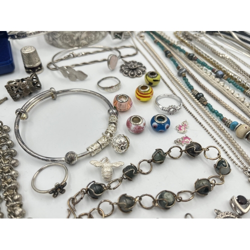 2082 - A large collection of .925 silver and white metal jewellery to include pendants, necklaces bangles, ... 