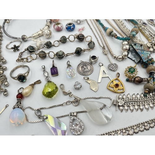 2082 - A large collection of .925 silver and white metal jewellery to include pendants, necklaces bangles, ... 