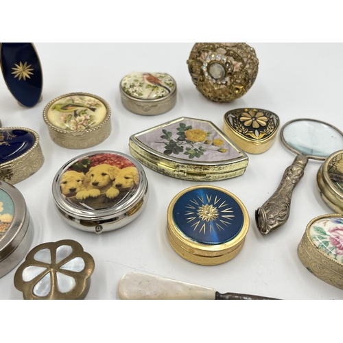 2109 - A collection of early 20th century and later lady's items to include white metal magnifying glass, w... 