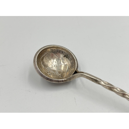 2127 - An 1886 Brazilian 2000 Reis .917 silver coin spoon with twisted white metal handle - approx. gross w... 