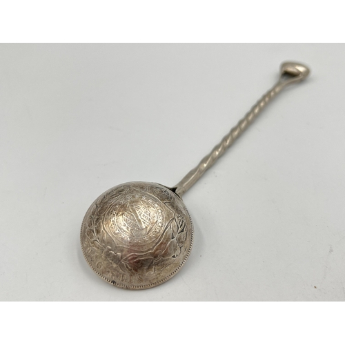 2127 - An 1886 Brazilian 2000 Reis .917 silver coin spoon with twisted white metal handle - approx. gross w... 