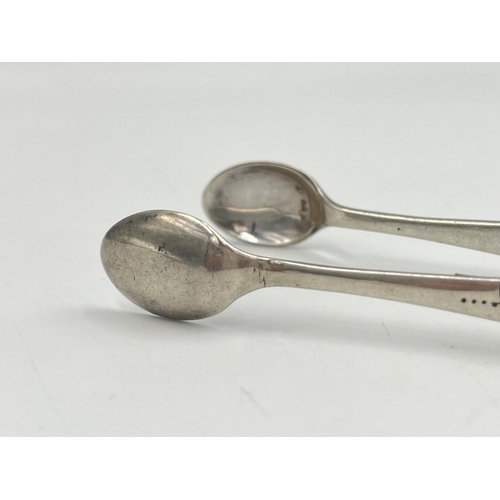 2143 - A pair of Victorian hallmarked Birmingham silver sugar tongs, dated 1894 - approx. gross weight 20g