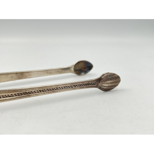 2146 - A pair of George III hallmarked sterling silver sugar tongs - approx. gross weight 34g