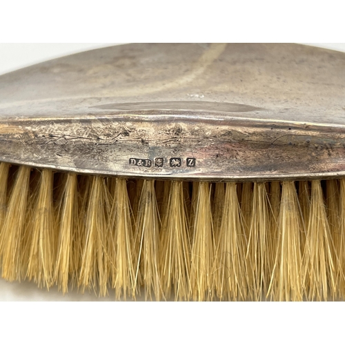 2147 - A Docker & Burn Ltd. hallmarked Birmingham silver clothes brush, dated 1924 - approx. gross weight 1... 