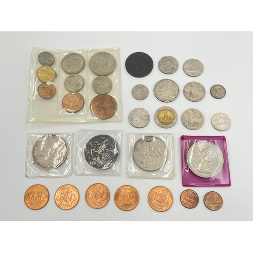 2179 - A collection of worldwide coins to include George III halfpenny, George V 50% silver crown, George V... 