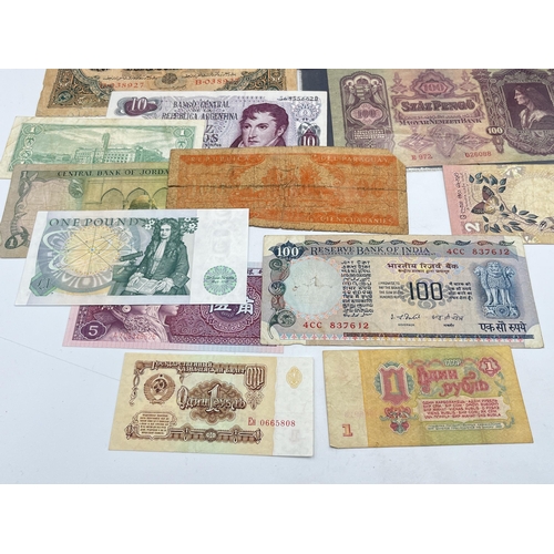 2182 - A collection of worldwide bank notes to include 100, 500 and 5000 Russian Roubles, 1930 100 Hungaria... 