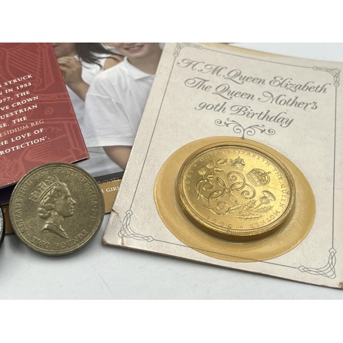 2186 - A collection of Great British Commemorative coins to include H.M. Queen Elizabeth The Queen Mother's... 