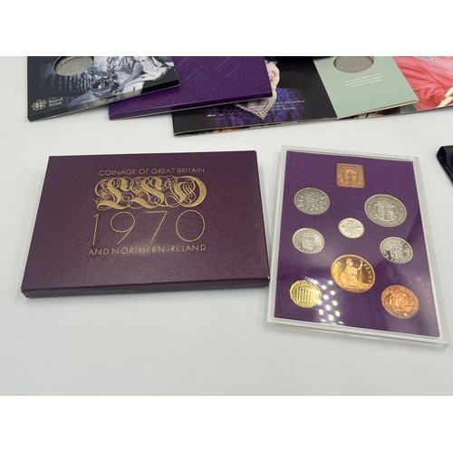 2186 - A collection of Great British Commemorative coins to include H.M. Queen Elizabeth The Queen Mother's... 