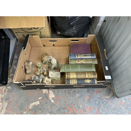 1005 - A box containing Lilliput Lane ornaments and six late 19th and early 20th century hardback books to ... 