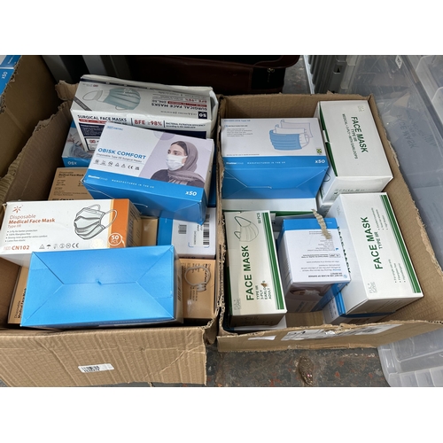 1013 - Five boxes containing a large collection of disposable medical face masks