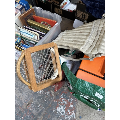 1020 - Four boxes and two bags containing novelty Christmas cards, books, toys, brass wall mountable letter... 