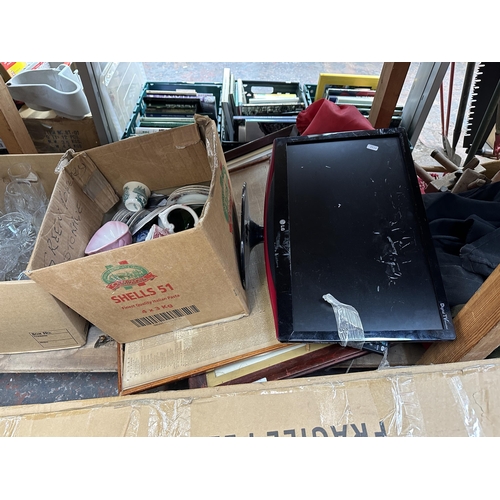 979 - A large collection of house clearance items to include LG digital TV, treenware, glassware, ceramics... 