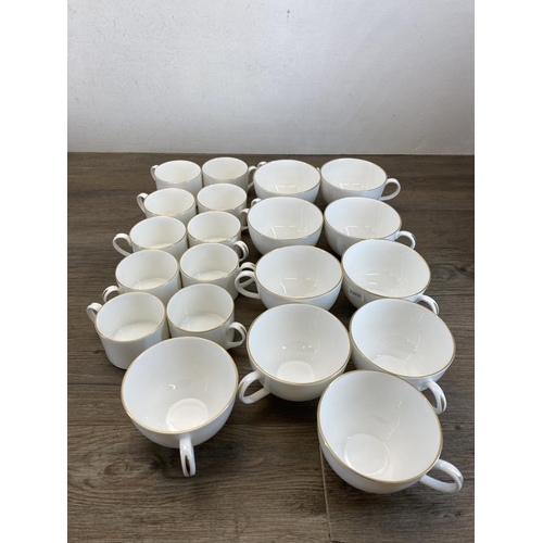 335 - A collection of Caverswall English fine bone china