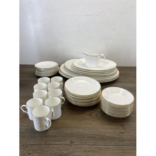 335 - A collection of Caverswall English fine bone china