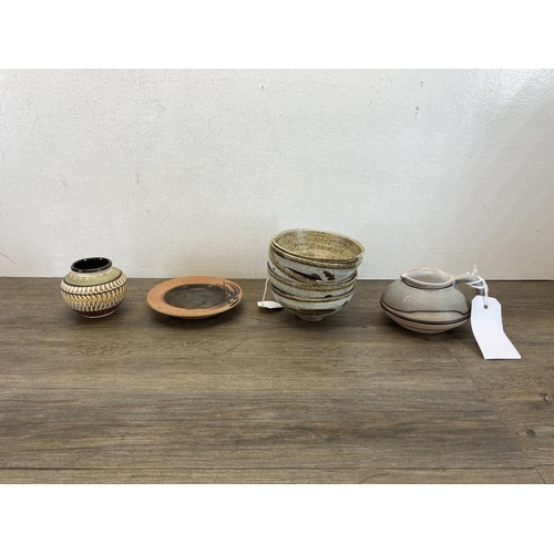 356 - A collection of studio pottery to include five bowls by Francis Glanville Cooper, Kamini vase etc.