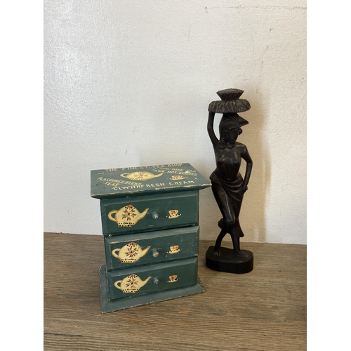 371 - A collection of treenware to include carved stork table lamp, elephant figurines, model boat etc.