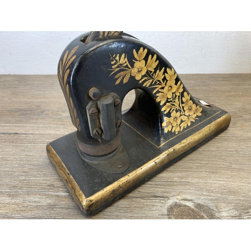 384 - Two pieces of metalware, one early 20th century deed box and one Victorian black and gold painted st... 