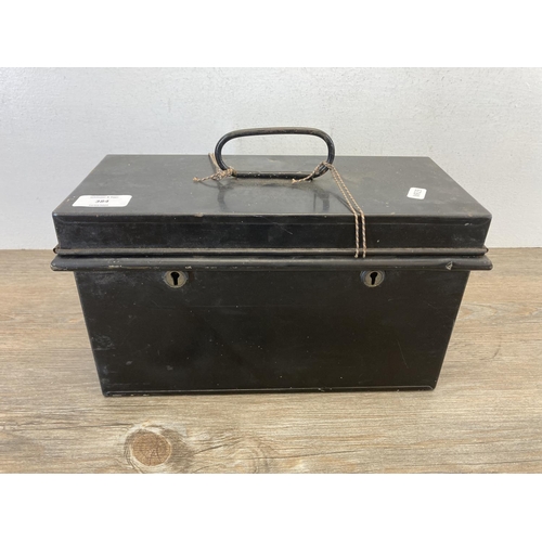 384 - Two pieces of metalware, one early 20th century deed box and one Victorian black and gold painted st... 