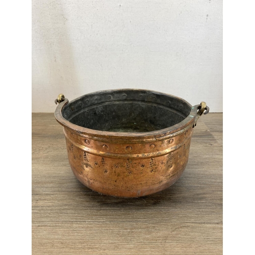 390 - Two Victorian preserve pans, one brass and one copper - largest approx. 26cm diameter