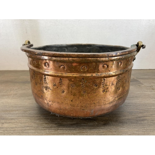 390 - Two Victorian preserve pans, one brass and one copper - largest approx. 26cm diameter