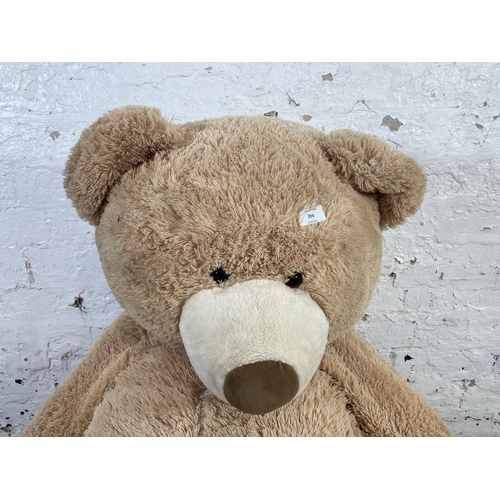 394 - A Hugfun International large teddy bear - approx. 140cm high