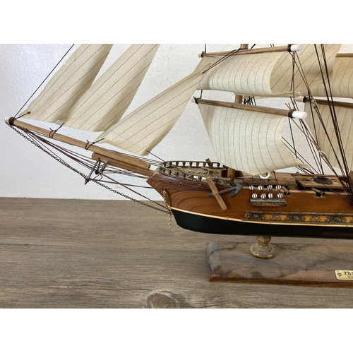 399 - Two wooden models, one Fragata Siglo XVIII ship and one canal boat - largest approx. 50cm high x 72c... 