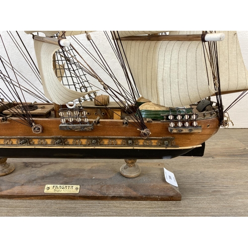 399 - Two wooden models, one Fragata Siglo XVIII ship and one canal boat - largest approx. 50cm high x 72c... 