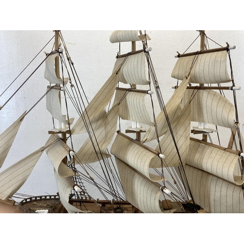 399 - Two wooden models, one Fragata Siglo XVIII ship and one canal boat - largest approx. 50cm high x 72c... 