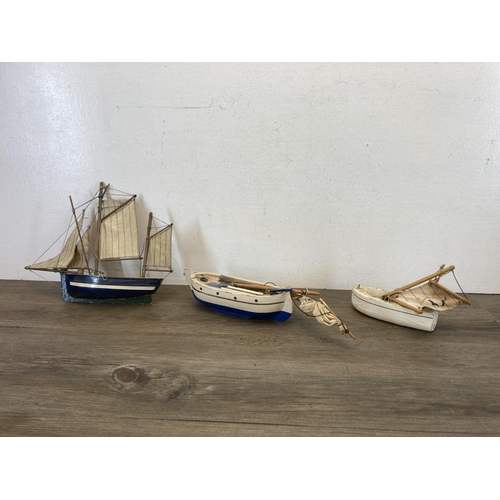 402 - Six wooden models to include Clipper Ship - approx. 40cm high etc.