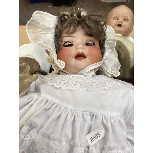 412 - A collection of porcelain and composition dolls to include Armand Marseille 518/5½K etc.