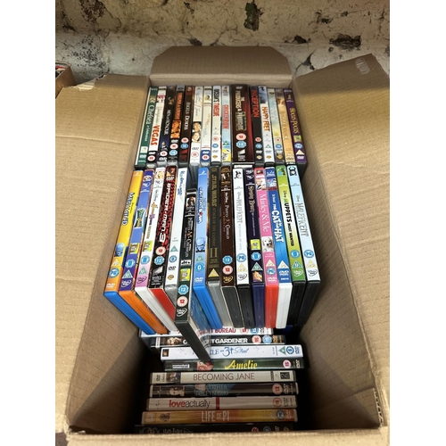 600 - Two boxes, one containing DVDs and one containing CDs