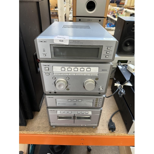 619 - A Sony MHC-NX1 Mini hi-fi system comprising Dolby B twin cassette deck, five disc changer CD player,... 