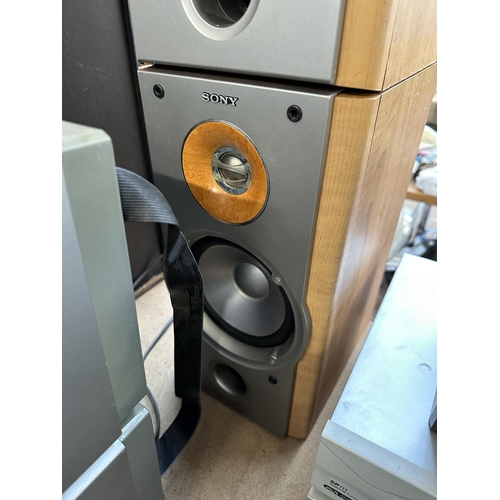 619 - A Sony MHC-NX1 Mini hi-fi system comprising Dolby B twin cassette deck, five disc changer CD player,... 