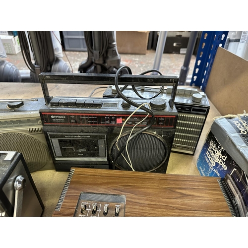 638 - Six vintage radios to include two Rank Radio International, Murphy MW5775A four-band, boxed Fawn EMI... 