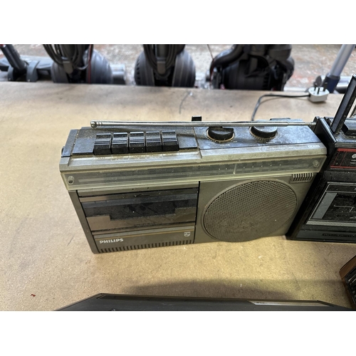 638 - Six vintage radios to include two Rank Radio International, Murphy MW5775A four-band, boxed Fawn EMI... 