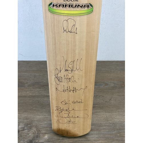 441 - A Kookaburra Kahuna Doom cricket bat with eight signatures from the 2009 Australia Ashes test team