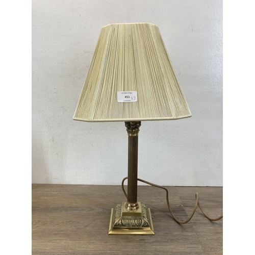 451 - Three brass Corinthian column table lamps - largest approx. 70cm high