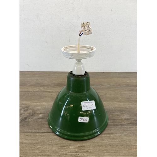 452A - A vintage industrial green enamel light shade - approx. 20cm high including fitting