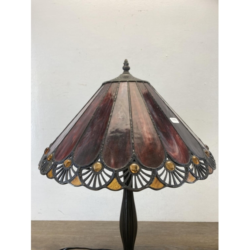 453 - A Tiffany style bronzed table lamp with stained glass shade - approx. 55cm high