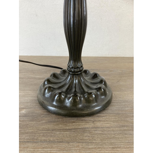 453 - A Tiffany style bronzed table lamp with stained glass shade - approx. 55cm high