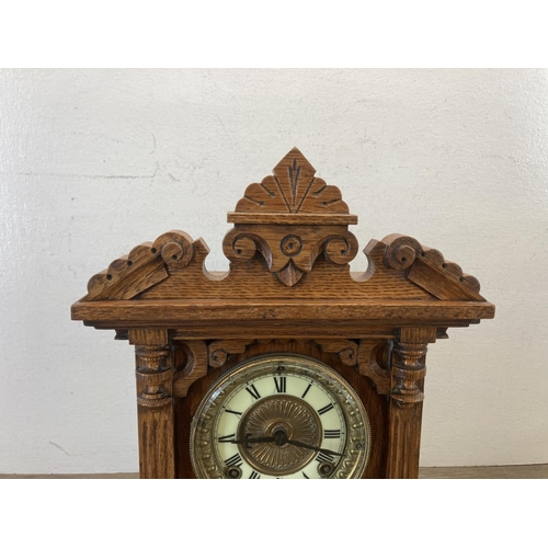 465 - A late 19th/early 20th century Ansonia Clock Company New York United States of America carved oak ca... 