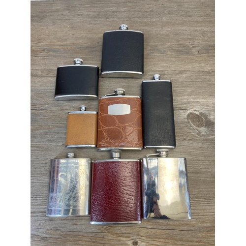 466 - A collection of hip flasks to include pewter, stainless steel etc.