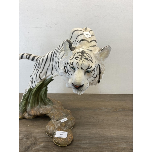 480 - A resin white tiger figurine - approx. 36cm high