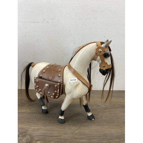 491 - Five Progressive Inter Product Co. Ltd. hand painted carved wooden horse figurines - approx. 31cm hi... 