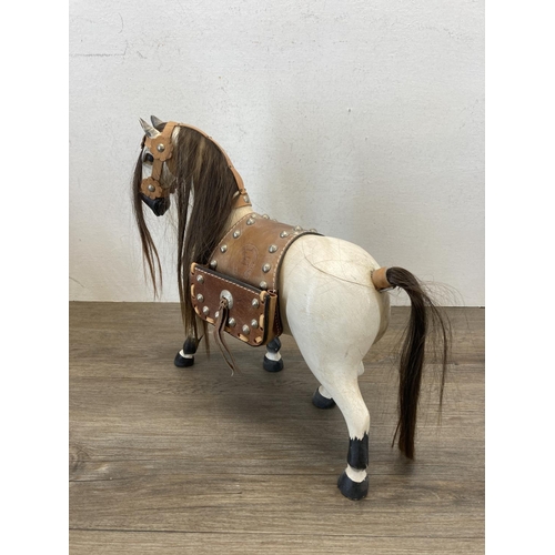 491 - Five Progressive Inter Product Co. Ltd. hand painted carved wooden horse figurines - approx. 31cm hi... 