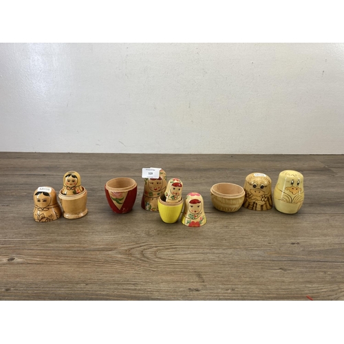 529 - Three Russian hand painted wooden nesting dolls - largest approx. 14cm high