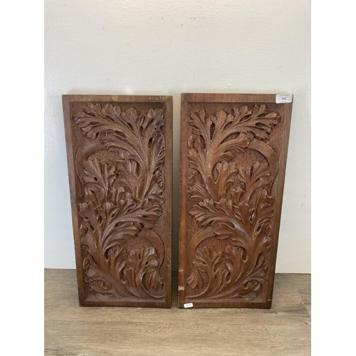 533 - A pair of carved oak wall plaques - approx. 60cm high x 27cm wide