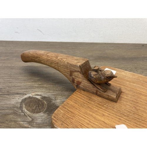 535 - A Bob 'Wren Man' Hunter carved oak cheeseboard - approx. 39cm long