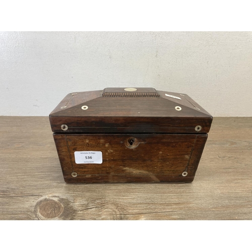 536 - A Georgian mother of pearl inlaid rosewood sarcophagus shaped two division tea caddy - approx. 13.5c... 